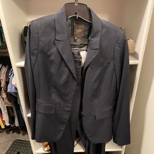 Limited Navy Blue Suit. Jacket size 6, pants 8R